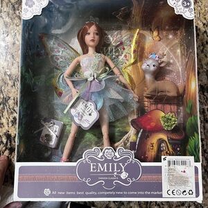 Emily Fairy Doll with Wings and doe.